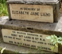 Land E J